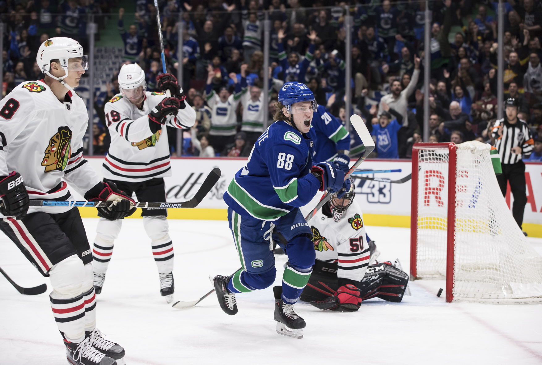 APTOPIX Blackhawks Canucks Hockey